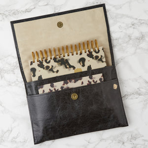 Hello Day 2024 spiral daily planner diary journal with tortoise design inside black vintage leather planner cover and mini notebook