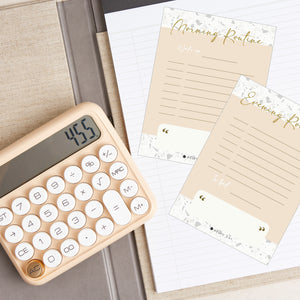 Hello Day Morning and Evening routine cards on A4 writing pad with cream calculator