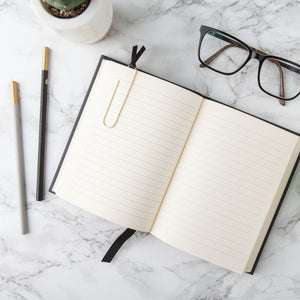 Open Journal with Paperclip